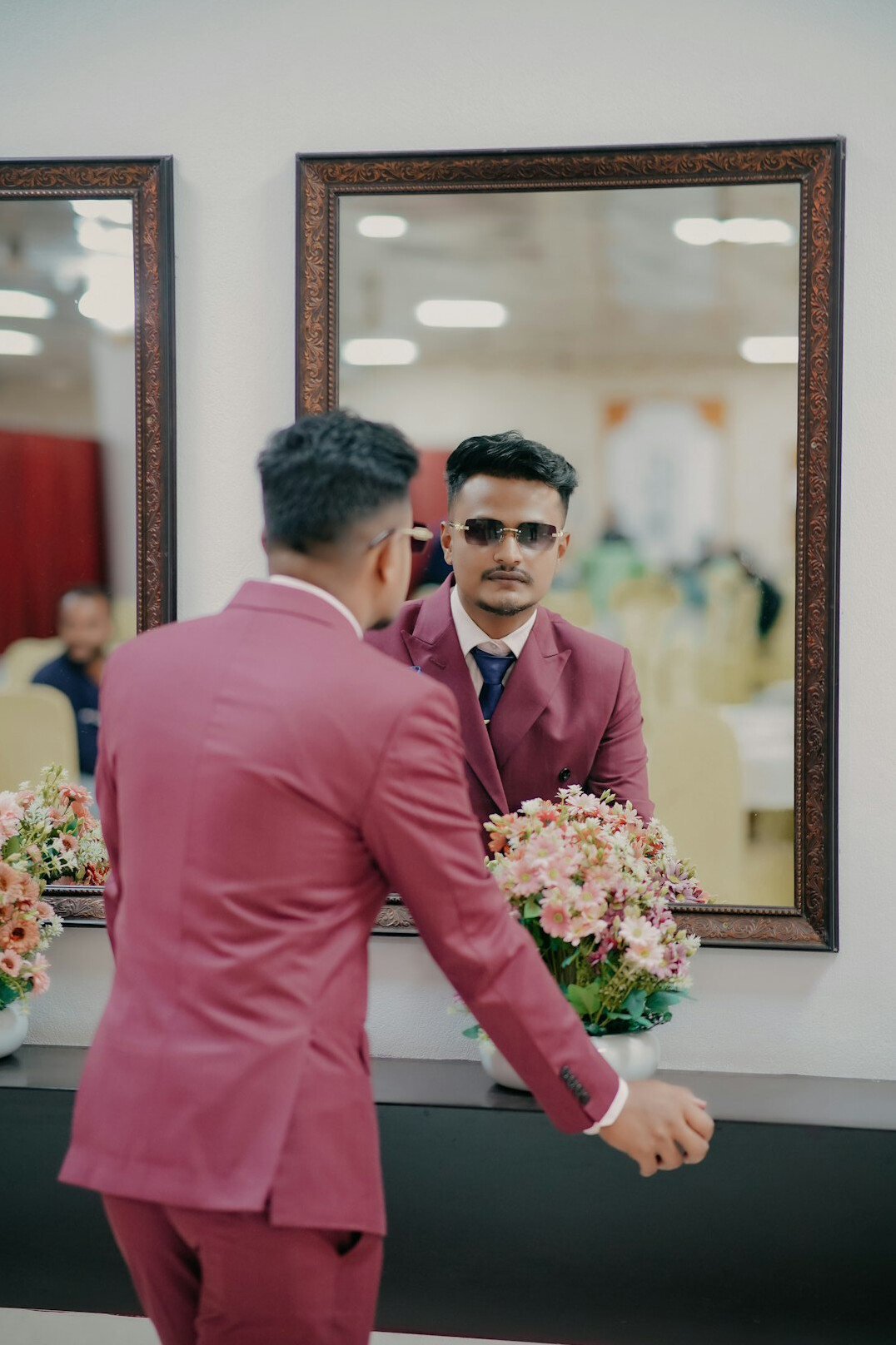 man practicing speech in mirror